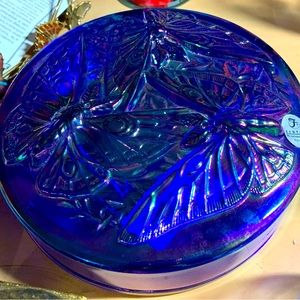 A crystal blue handmade era docente by Fenton, it’s new and authentic